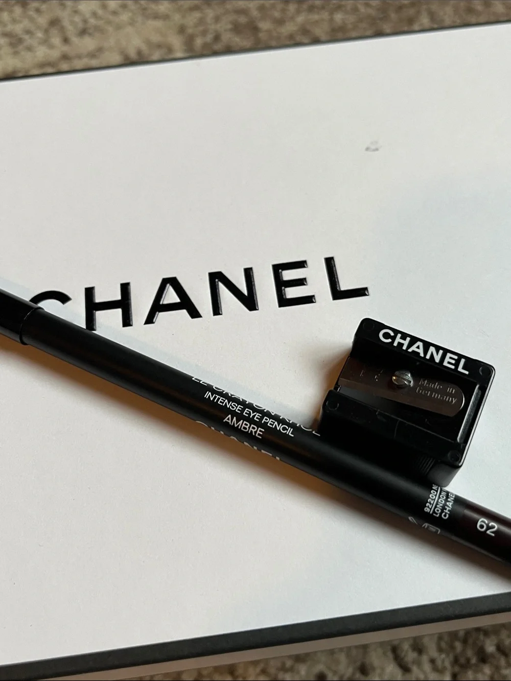 Chanel Pencil and Sharpener, brown color.